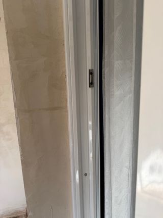 Puerta corredera acristalada