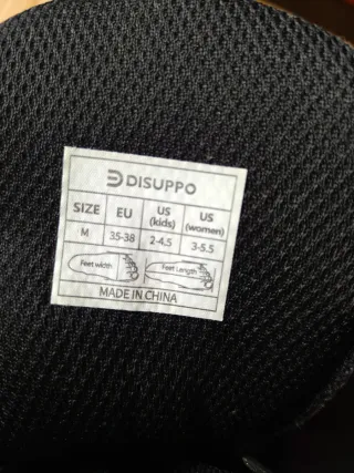 Patines en línea negros y rosas