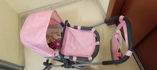 Carrito de muñecas rosa
