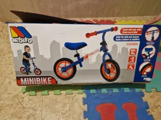 Bicicleta infantil azul y naranja