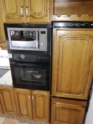 Cocina de madera y mármol