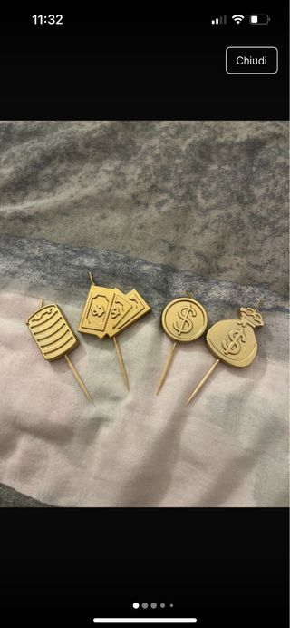 Candele a tema soldi e carte da gioco