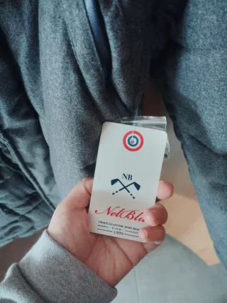 Abrigo acolchado gris con capucha 16 años