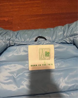 Piumino uomo nero e blu