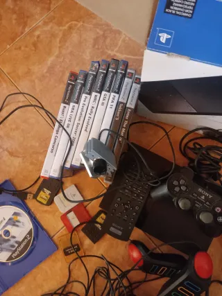 Consola PS2 con controller e accessori