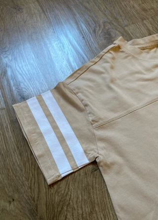 Camiseta H&M beige con rayas