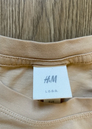 Camiseta H&M beige con rayas
