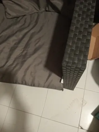 Poltrona da esterno grigia in rattan