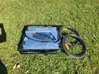 Carro porta niños para bicicleta