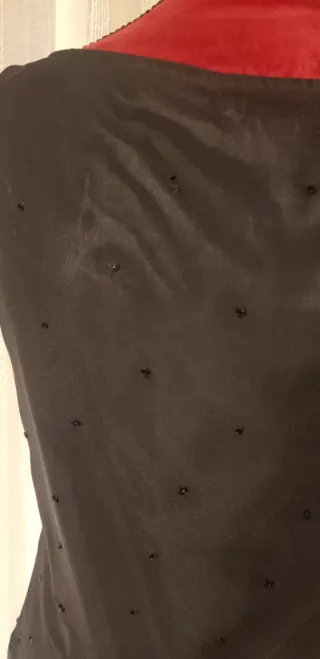 Top negro lentejuelas flores