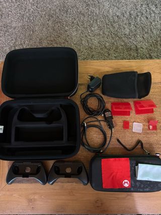 Pacchetto Nintendo Switch OLED Zelda Mando Pro Joycon