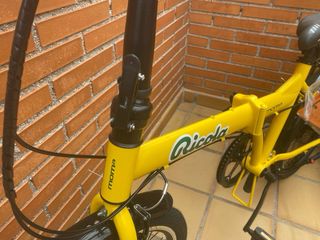 Bicicleta plegable Moma Ricola amarilla