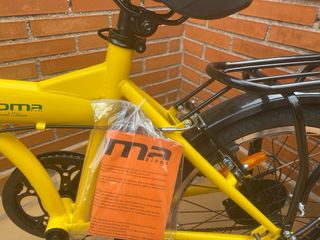 Bicicleta plegable Moma Ricola amarilla