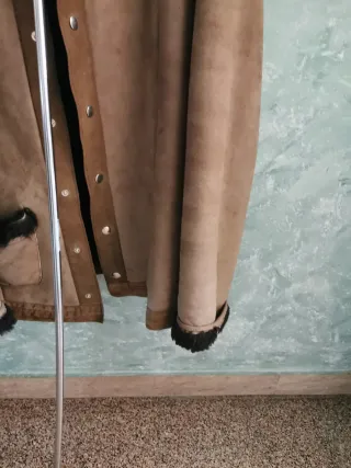 Giacca in montone marrone e nera