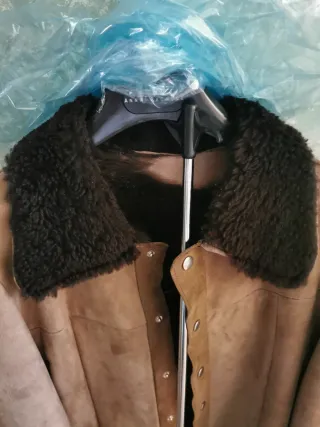 Giacca in montone marrone e nera