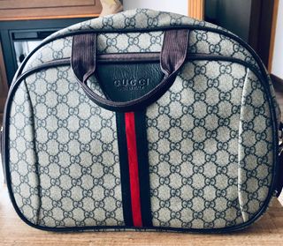 Bolso de viaje Gucci rígido