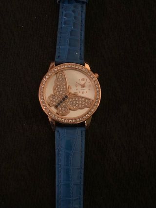 Reloj ajustable azul y dorado