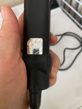 Piastra per capelli nera e rossa