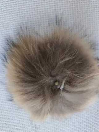 Pompón de pelo natural