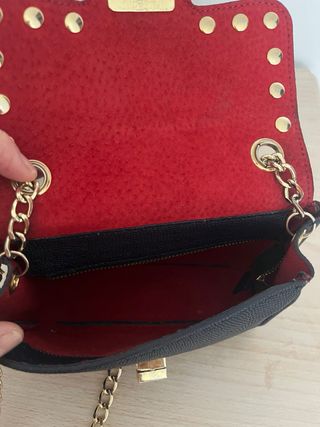 Bolso azul marino tachas doradas