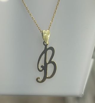 Colgante INICIAL en Oro de 18 ktes