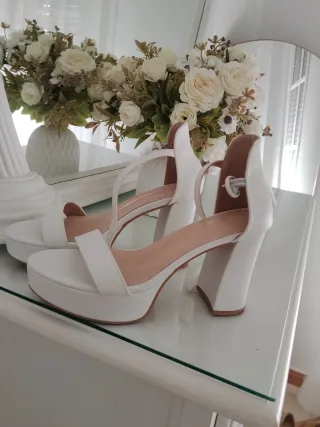 Sandali con zeppa bianche