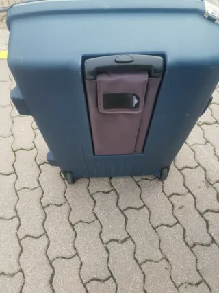 Maleta de viaje azul y gris