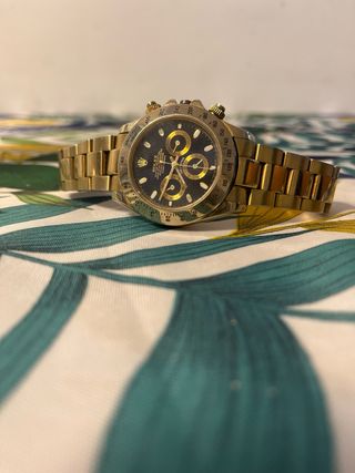 Reloj Rolex Daytona Negro y Dorado