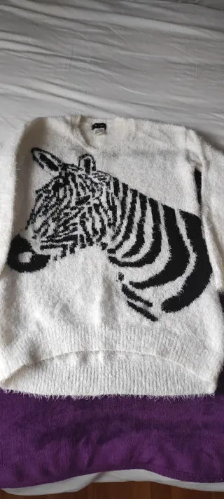 Jersey de punto blanco con cebra