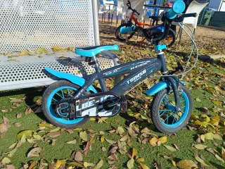 Bicicleta infantil azul y gris