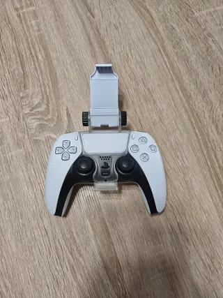 Mando PS5 con base para móvil