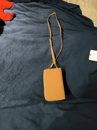 Monedero rosa con cadena