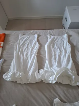 Stock vestiti bianchi festa/Capodanno