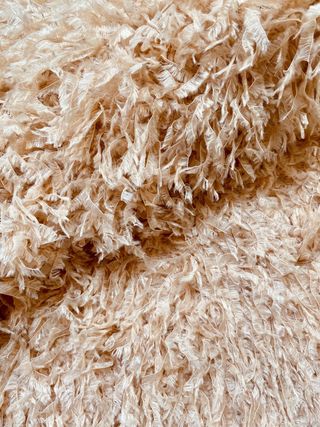 Camiseta manga corta con plumitas