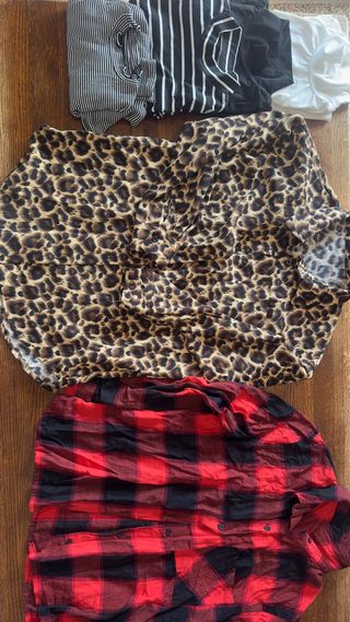 Consegna di abbigliamento donna taglia S/M e uomo taglia L/XL