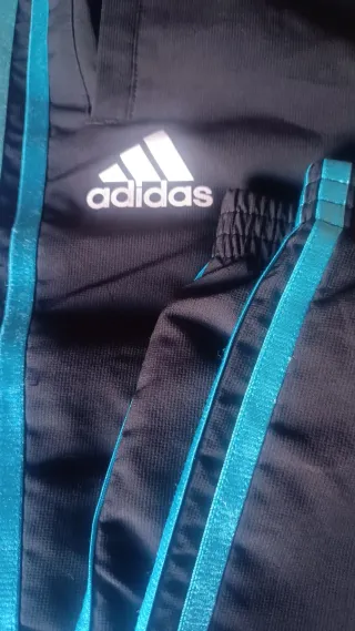 Pantalón chándal Adidas negro y turquesa