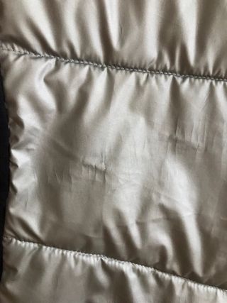 Chaqueta técnica deportiva Oysho plateada y negra