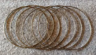 Set di sette braccialetti in argento vintage sottile