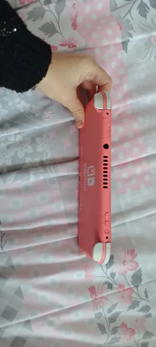Nintendo Switch Lite Rosa + custodia protettiva