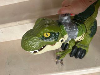 Dinosaurio articulado con figura fisher price