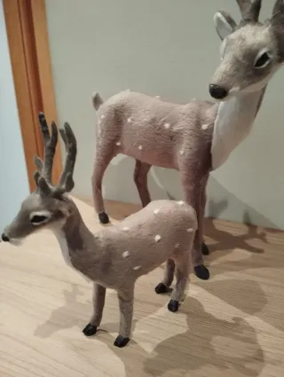 Pareja de renos navideños decorativos