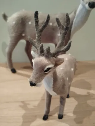 Pareja de renos navideños decorativos