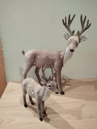 Pareja de renos navideños decorativos