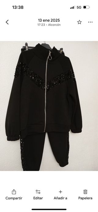Conjunto chándal negro con lentejuelas.