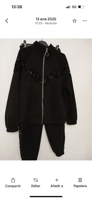 Conjunto chándal negro con lentejuelas.