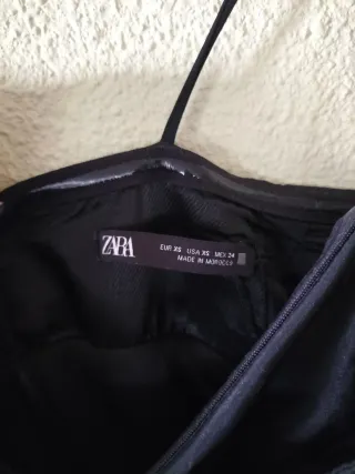 Vestido negro con lazo y lentejuelas