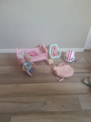 Baby Born con orinal, cambiador cuna y kit bici