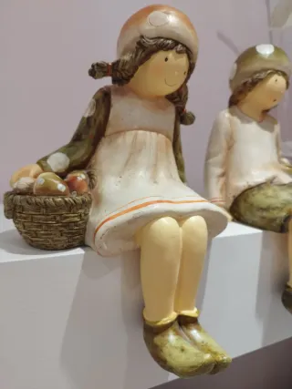 Figuras niño y niña resina
