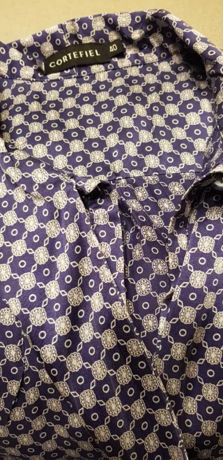 Blusa con lazada estampado floral azul y gris