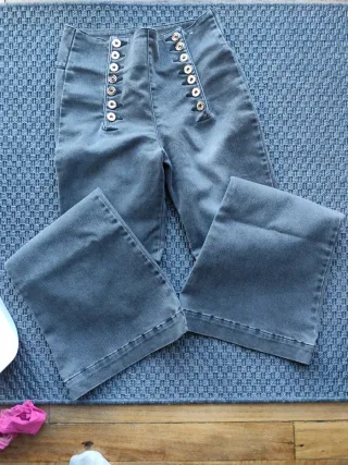 Dos antalones  vaqueros negros anchos. Talla 34